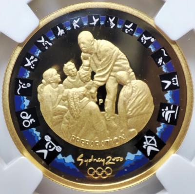 картинка 100 долларов. 2000 г. Олимпиада в Сиднее. Толкатель ядра. Au 10 г. от магазина Одежда+