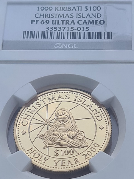 картинка Кирибати. 100 Долларов 1999 г. Золото. 15.55 г*0.999 0.5 oz. СЛАБ NGC PF 69 ULTRA CAMEO! от магазина Одежда+ 3