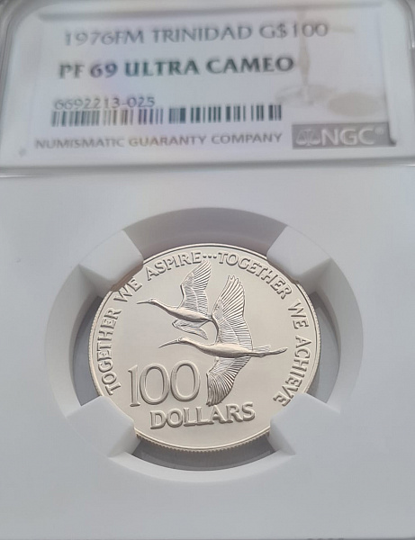 картинка Тринидад и Тобаго. 100 Долларов 1976 г. Золото 6.21г*0.500 0.0998 oz. СЛАБ NGC PF 69 ULTRA CAMEO! от магазина Одежда+ 3